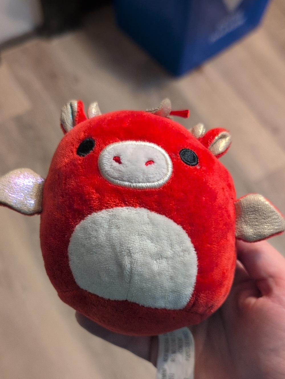 Squishmallows Red Plush Cow with Cream Belly and Shimmer Gold Accents
